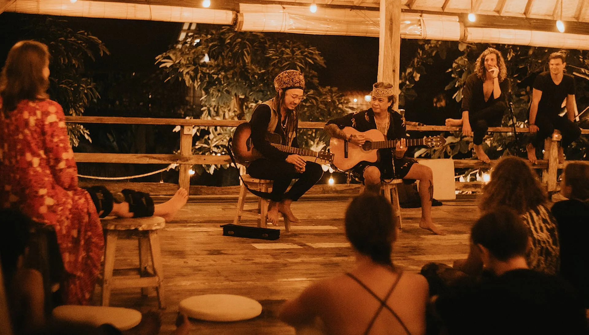 Two guitarists performing at Unplugged